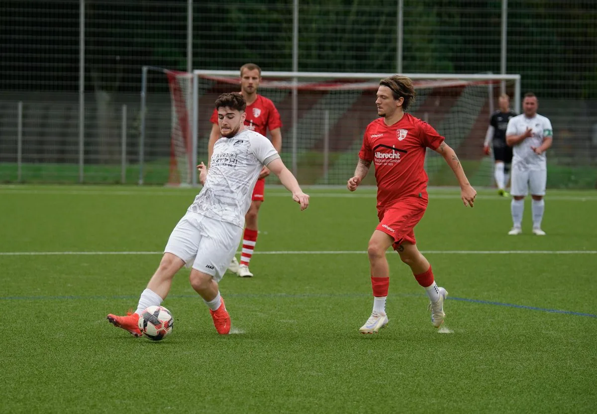 Football players in action during an outdoor match.